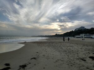 Beach picture, with cloudy sky overhead,